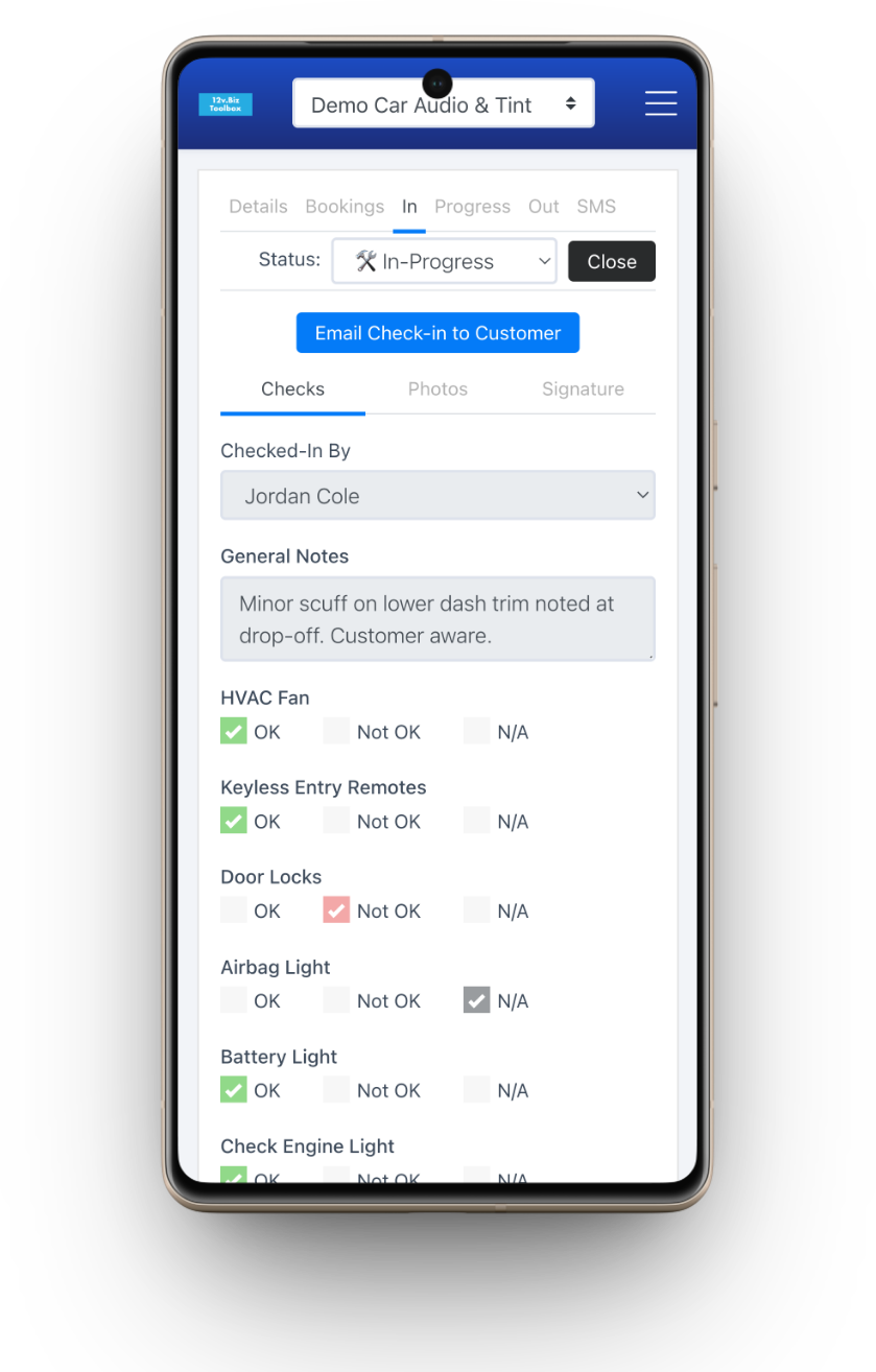Digital vehicle check-in on a phone: a pass/fail/N-A inspection checklist with saved vehicle photos and a captured customer signature.