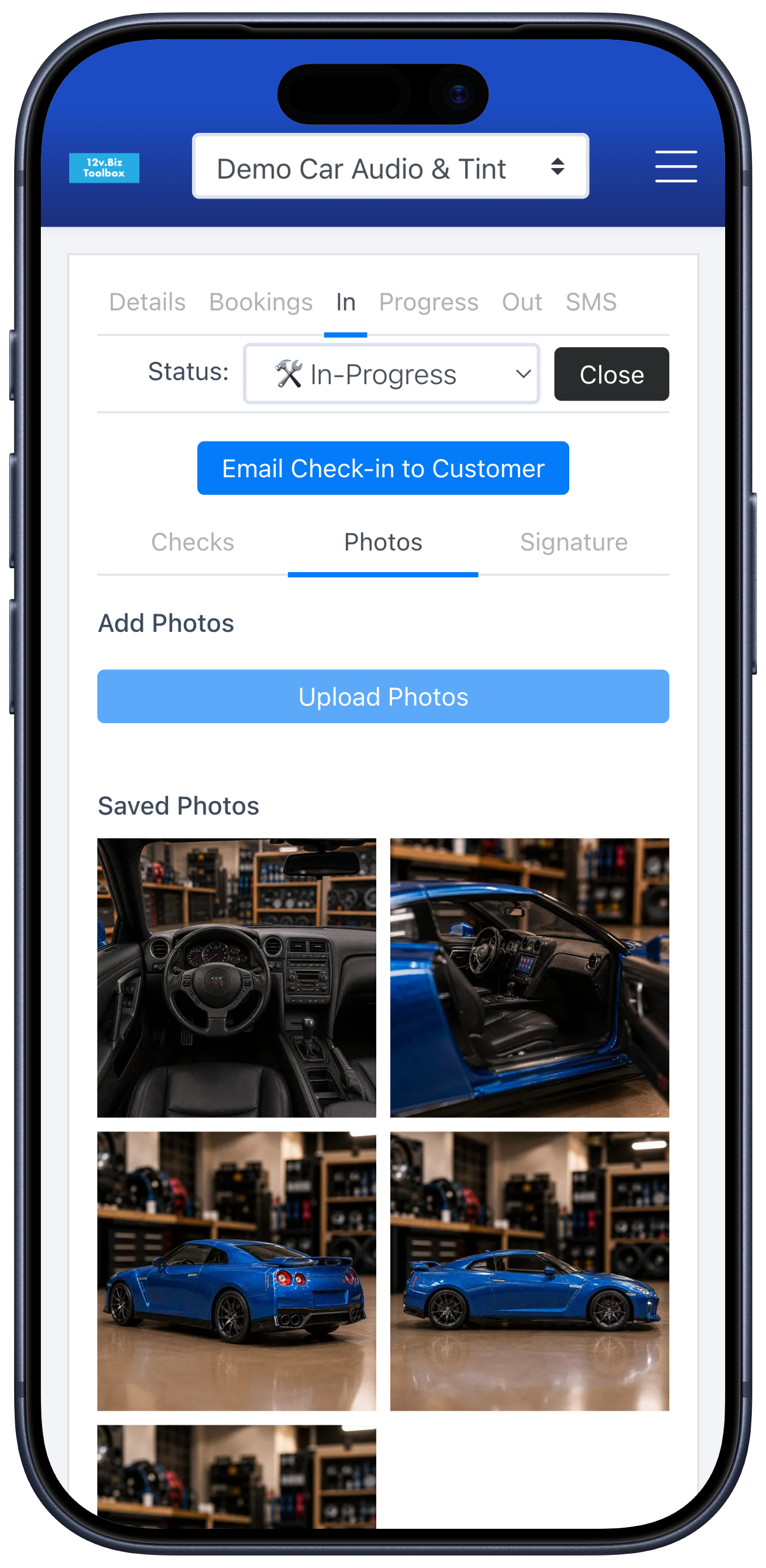 Check-in photos of the vehicle stored inside its work order, on the dedicated Photos tab.