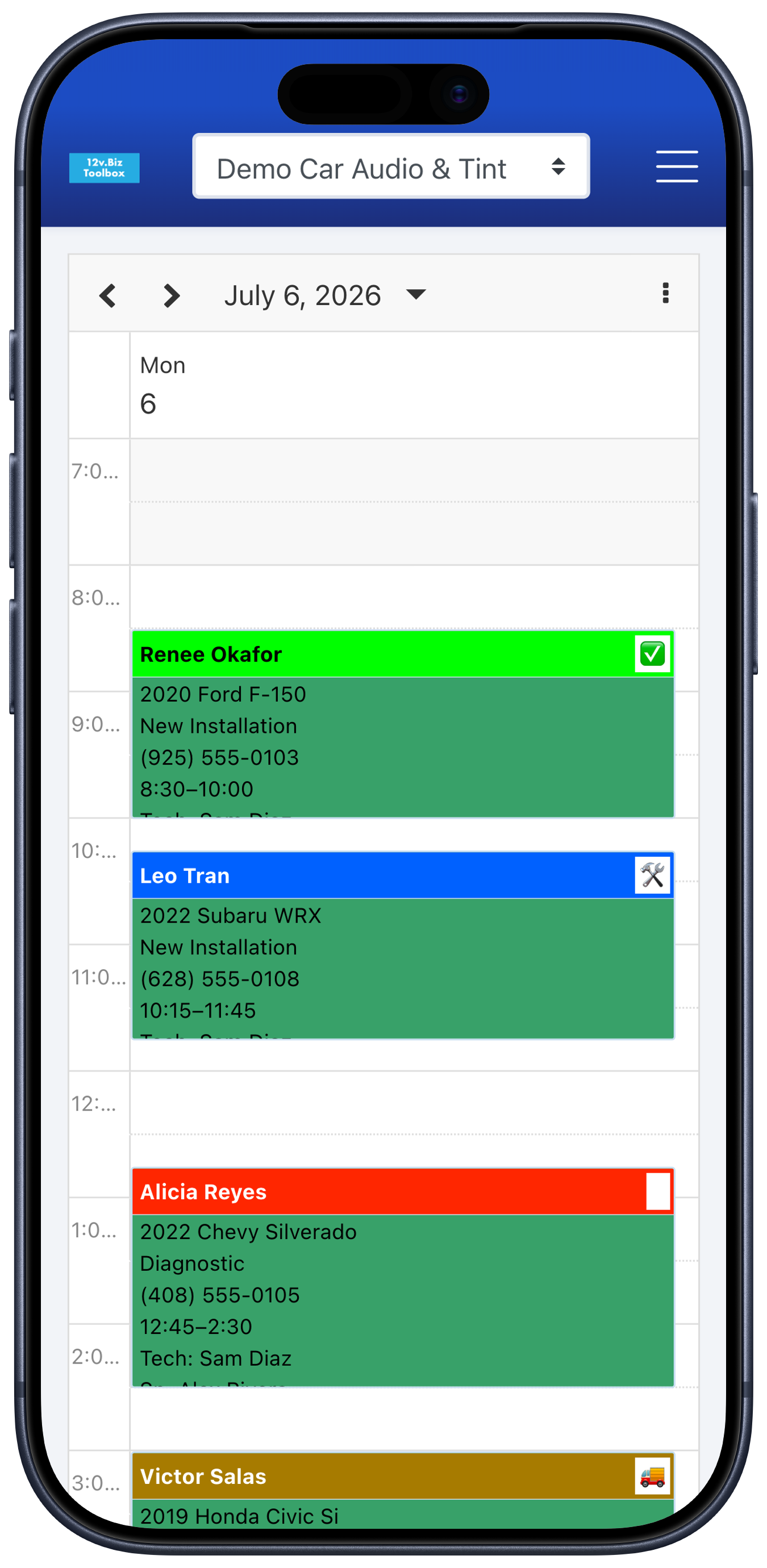 12v.Biz Toolbox Techs-Day scheduler: each technician's column with color-coded jobs — vehicle, time, and tech — for the day.